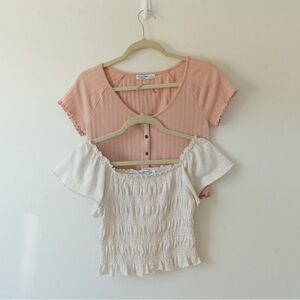 Set of 2 Arizona size small tops. One light pink & one is cream.